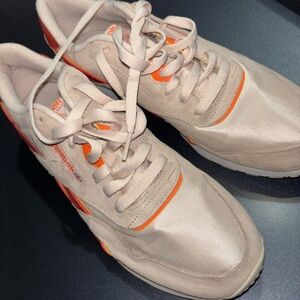 Orange and red Reebok classics